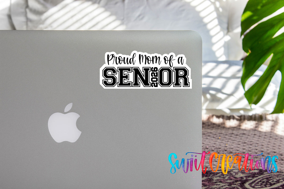 Proud Mom of a 2026 Senior sticker on the lid of a silver laptop