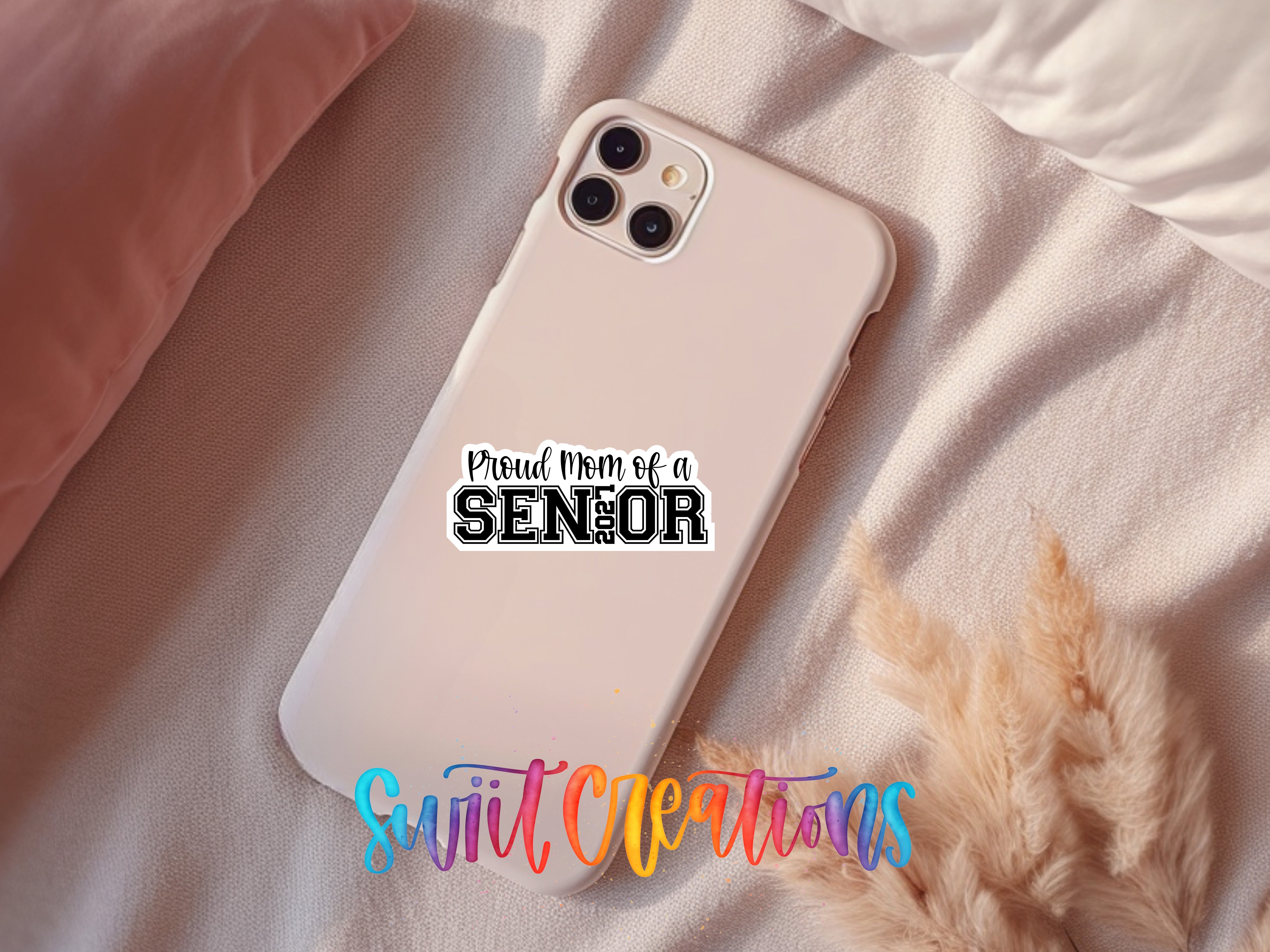 Proud Mom of a 2027 Senior waterproof vinyl sticker displayed on a phone case