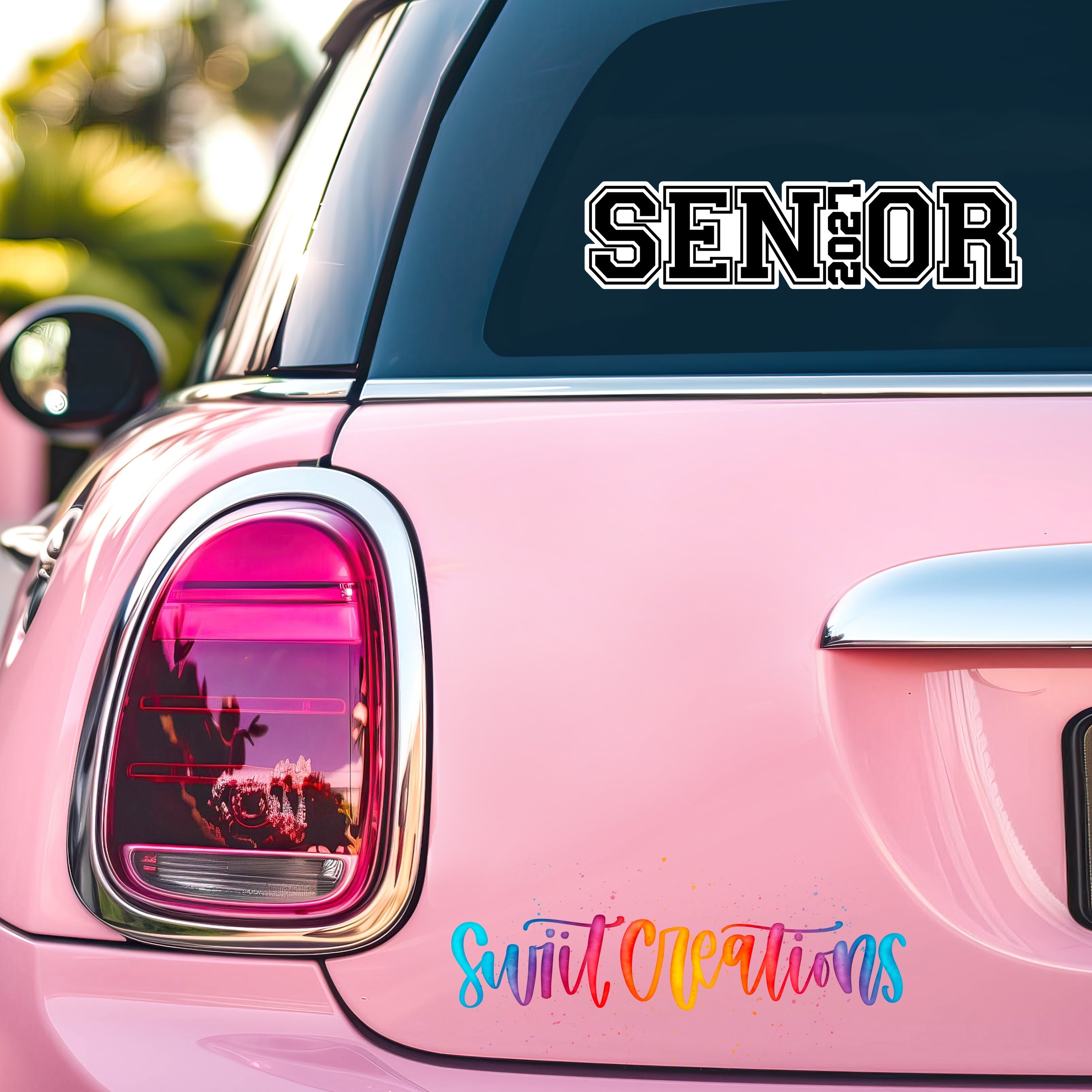 Senior 2027 waterproof vinyl sticker displayed on a car window
