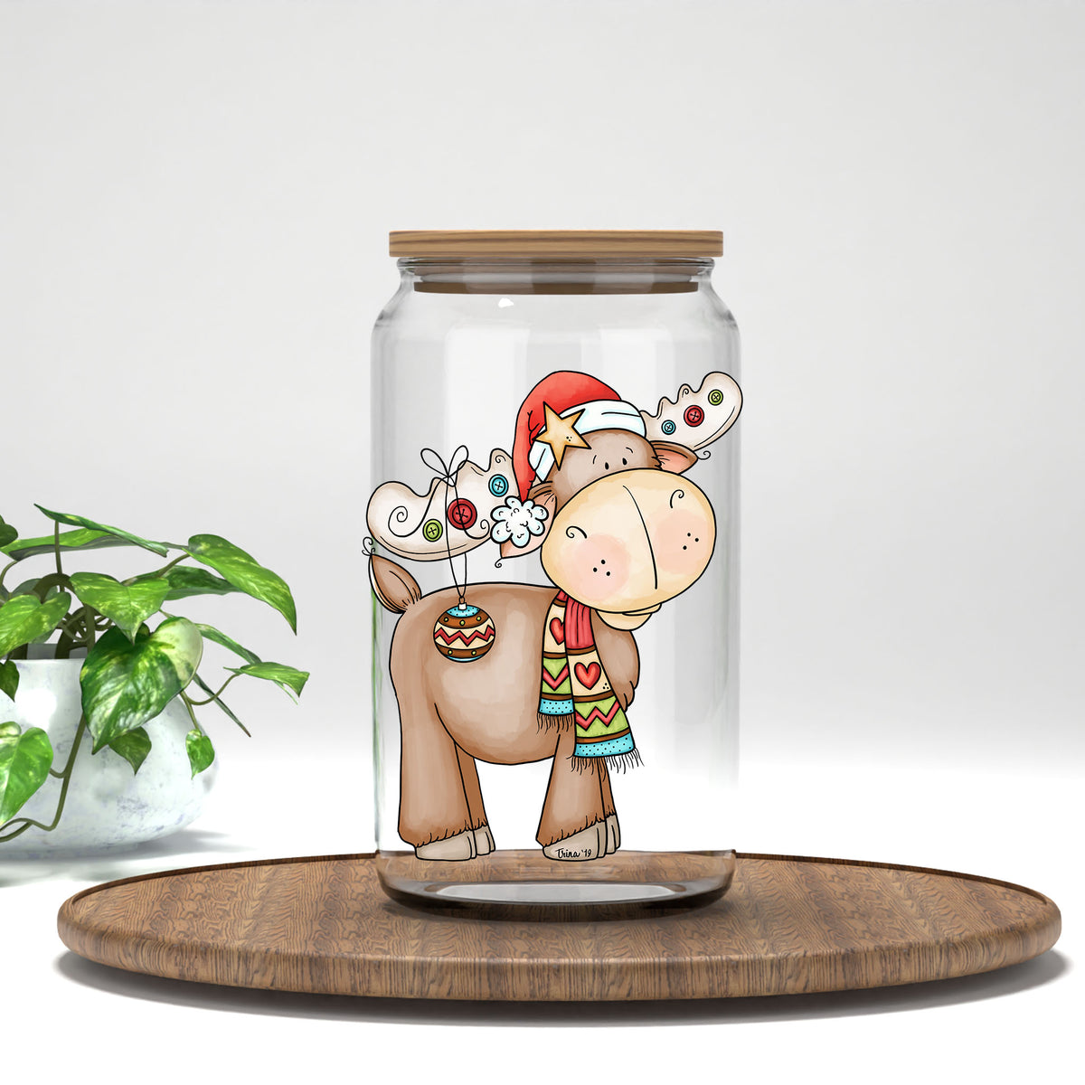 Christmas Moose UV DTF transfer on a clear glass can