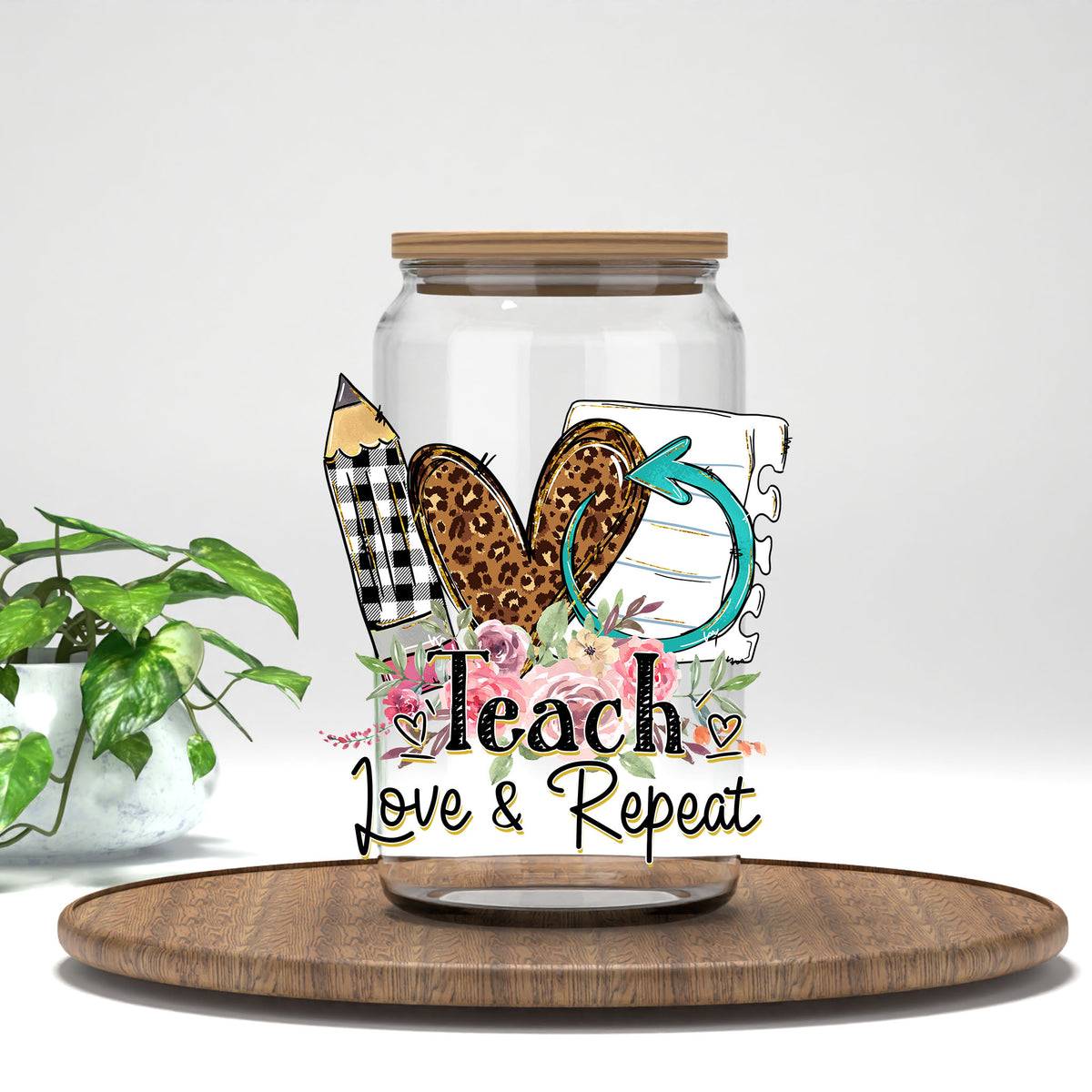 Teach Love and Repeat UV DTF transfer on a clear glass can