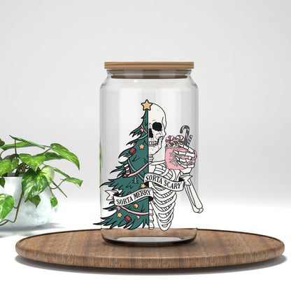 Sorta Merry Sorta Scary green tree skeleton UV DTF transfer on a clear glass can