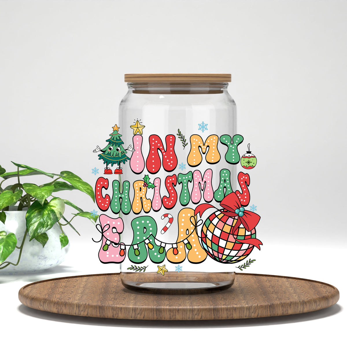 In My Christmas Era UV DTF transfer on a clear glass can