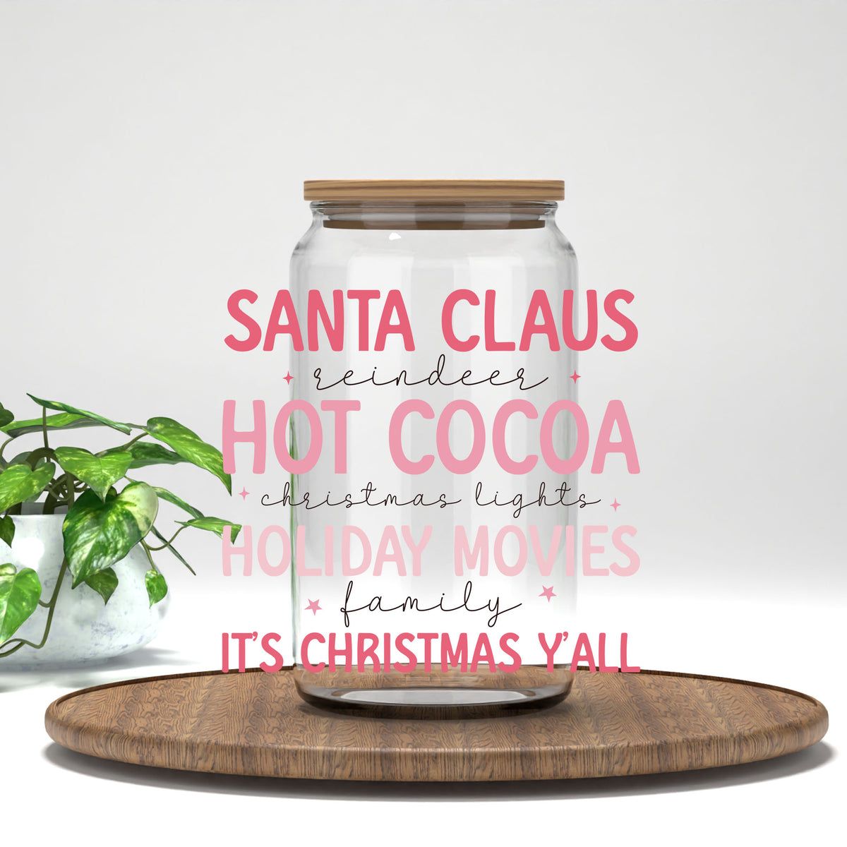 Pink Christmas Traditions UV DTF transfer on a clear glass can