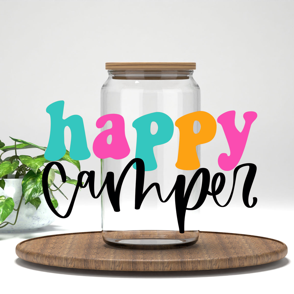 Happy Camper UV DTF transfer on a clear glass can
