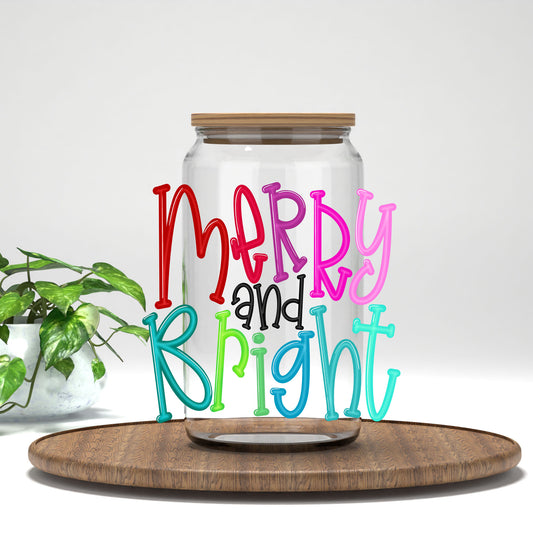 Merry and Bright colorful hand lettering UV DTF transfer on a clear glass can