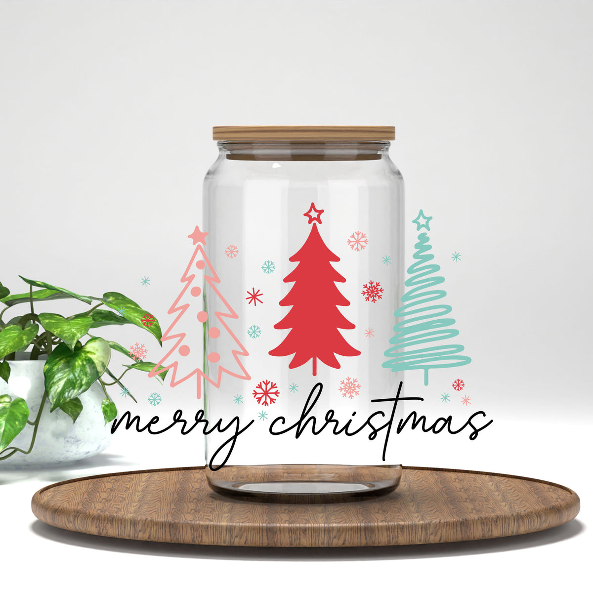 Merry Christmas UV DTF transfer on a clear glass can