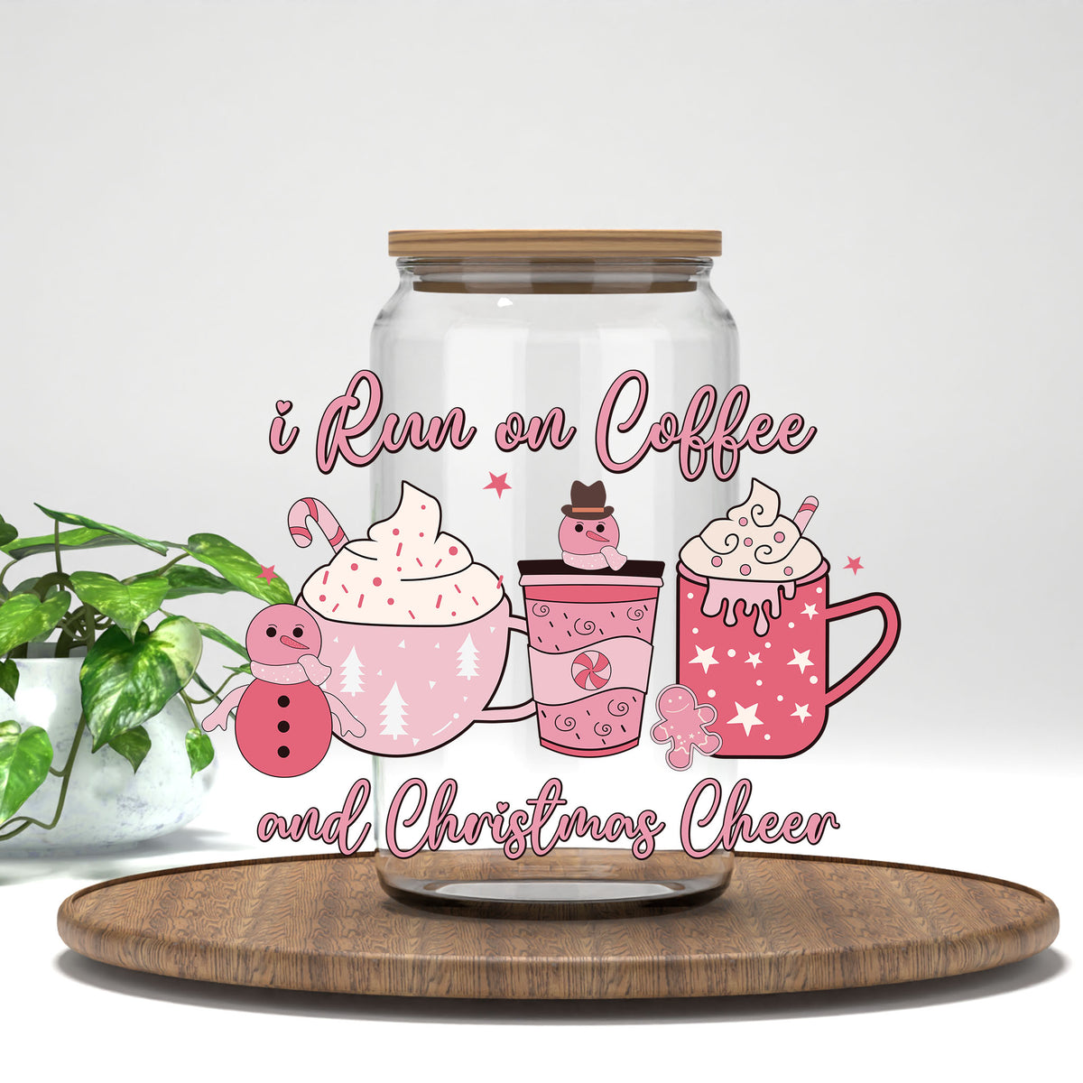 I Run on Coffee and Christmas Cheer pink cocoa mugs UV DTF transfer on a clear glass can