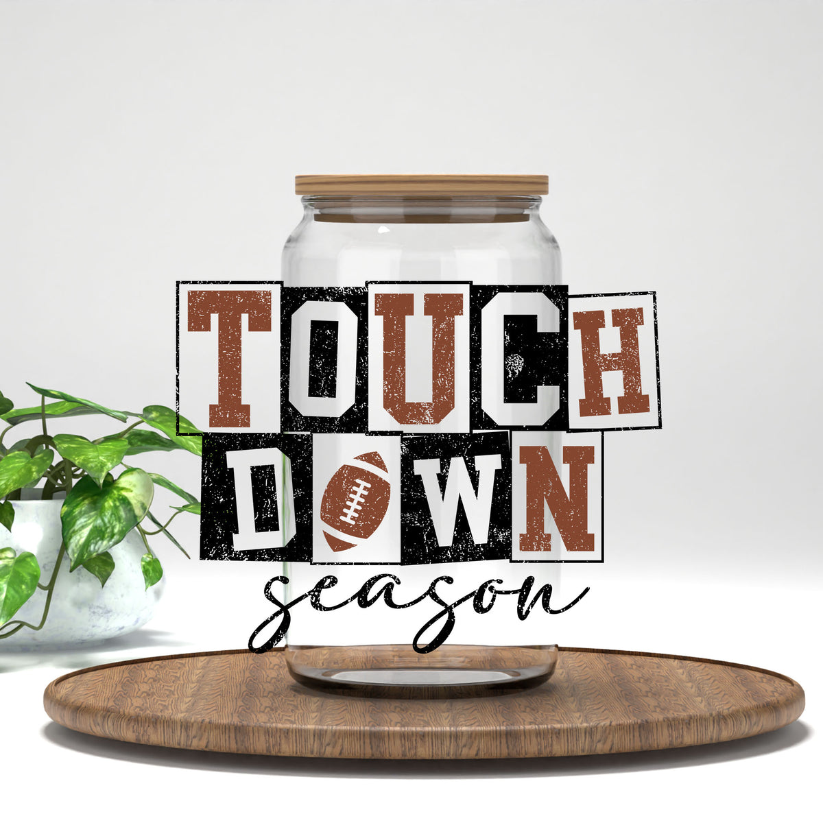 Touchdown Season UV DTF transfer on a clear glass can