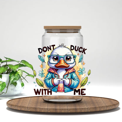 Don't Duck With Me duck in a blue jacket UV DTF transfer on a clear glass can