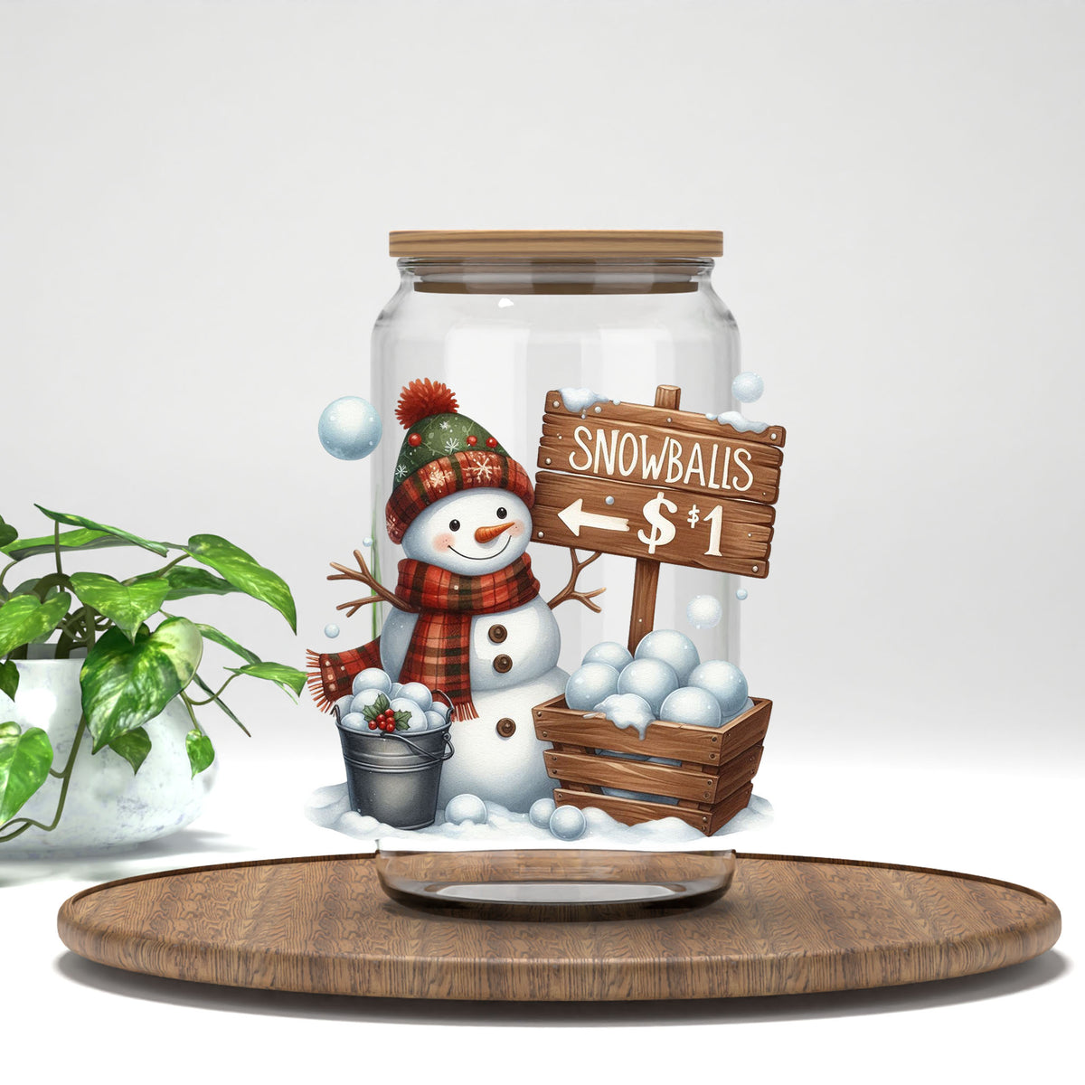 Snowballs $1 UV DTF transfer on a clear glass can