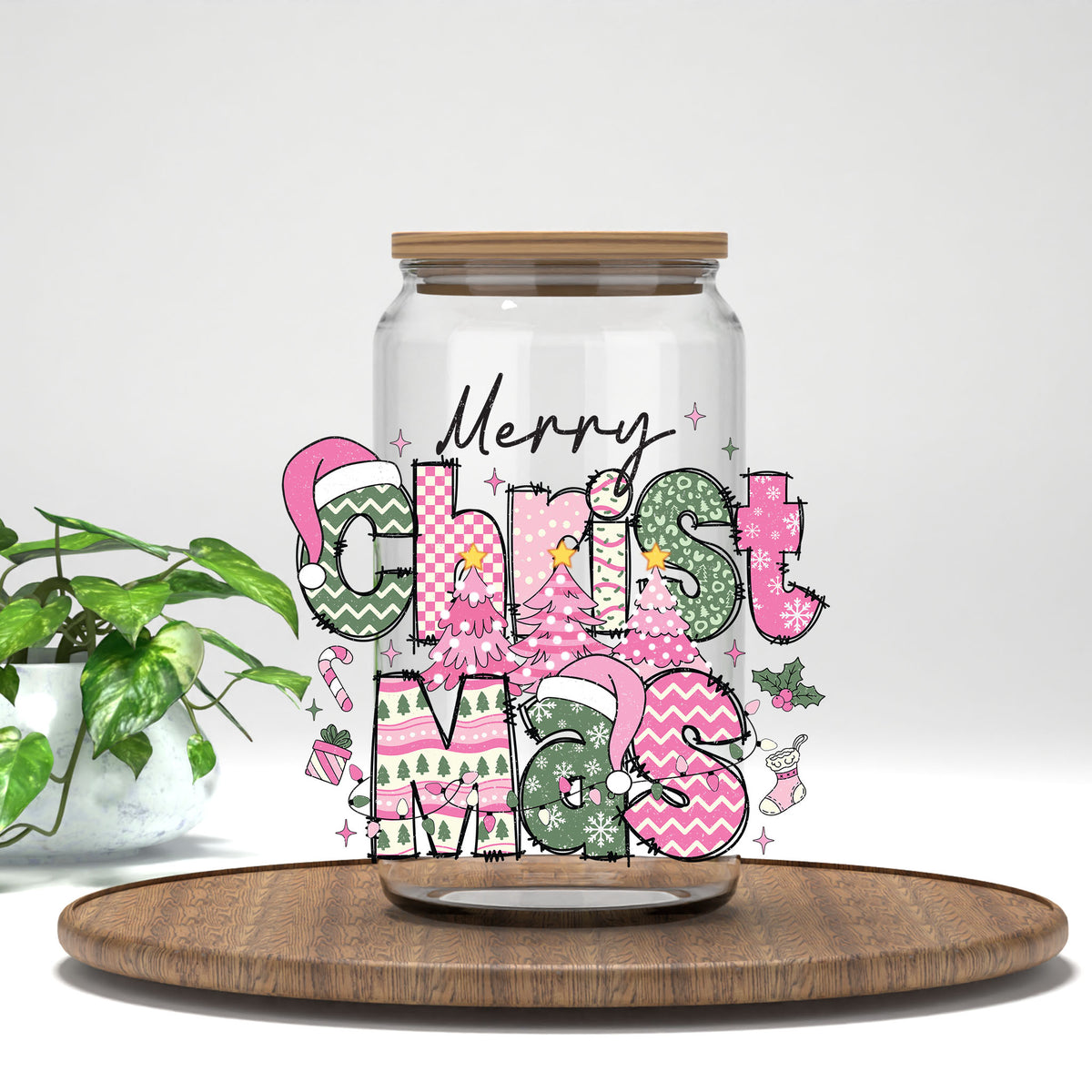 Merry Christmas Pink Patchwork UV DTF transfer on a clear glass can