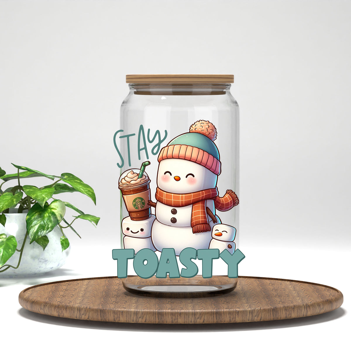 Stay Toasty UV DTF transfer on a clear glass can