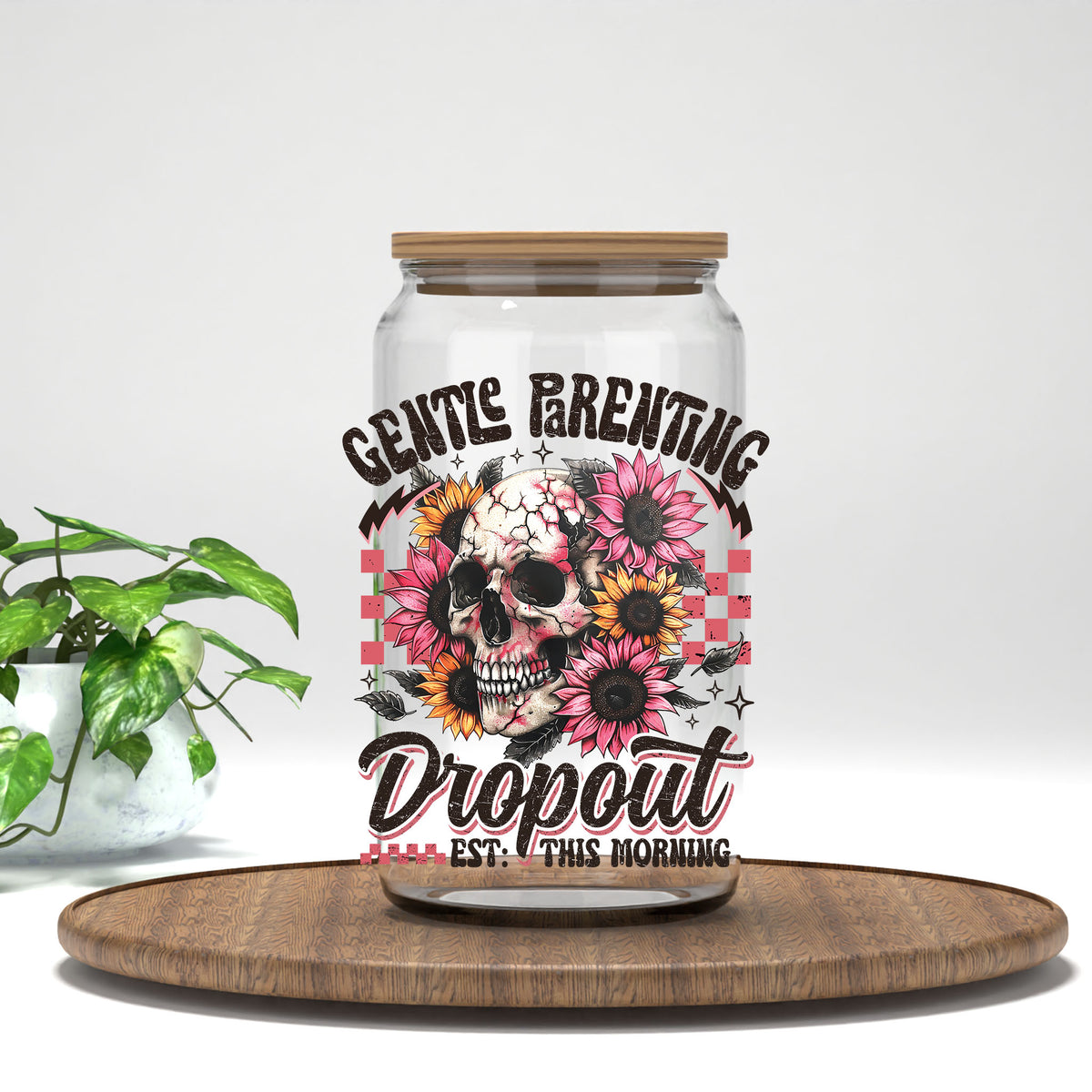 Gentle Parenting Dropout UV DTF transfer on a clear glass can