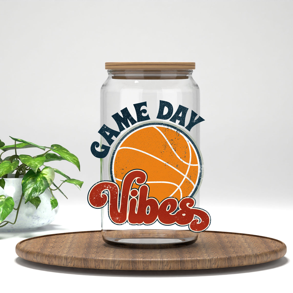 Game Day Vibes basketball UV DTF transfer on a clear glass can