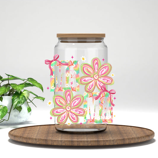 Mama tie dye flowers UV DTF transfer on a clear glass can