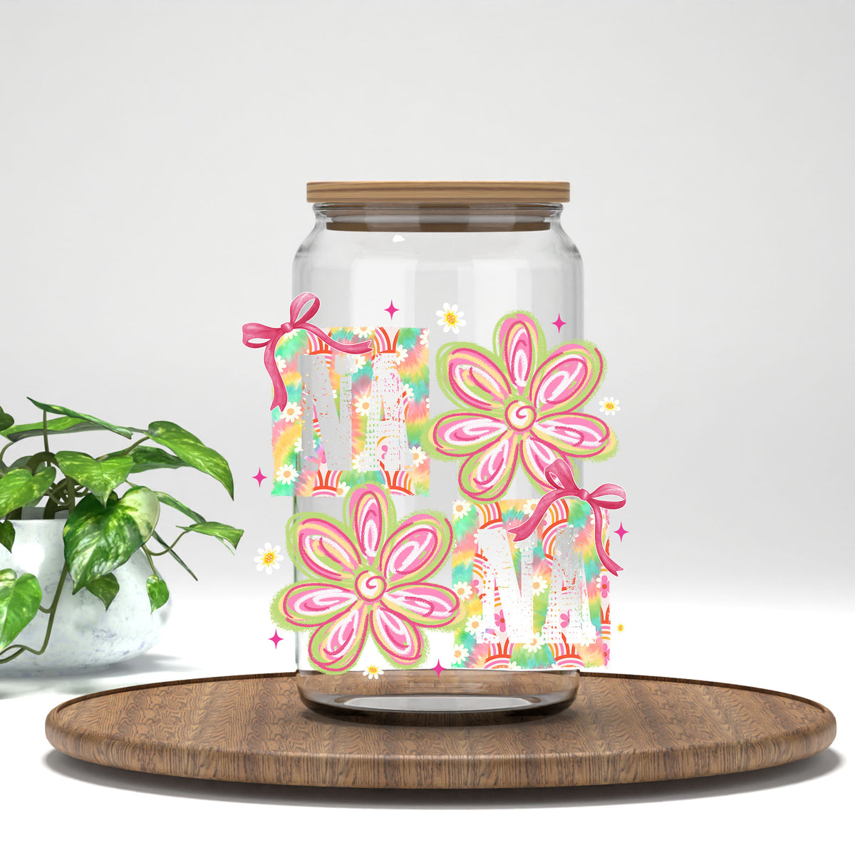 Nana boho pink flowers UV DTF transfer on a clear glass can