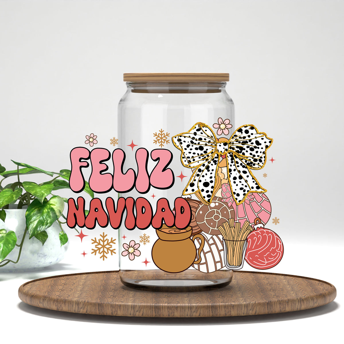 Feliz Navidad UV DTF transfer on a clear glass can