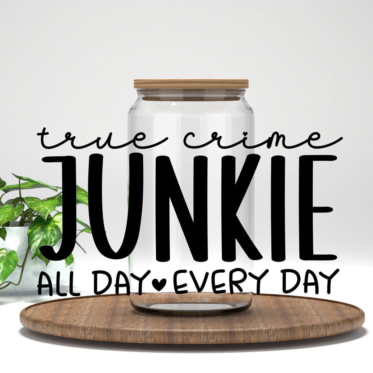 True Crime Junkie all day every day UV DTF transfer on a clear glass can
