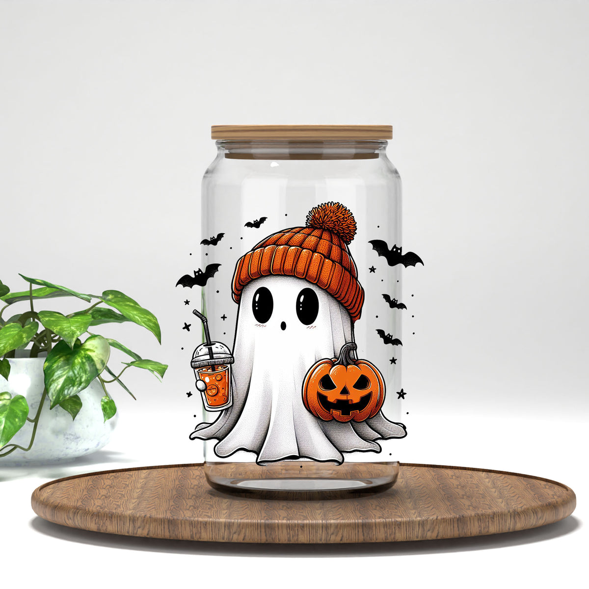 Ghostie Pumpkin Drink UV DTF transfer on a clear glass can