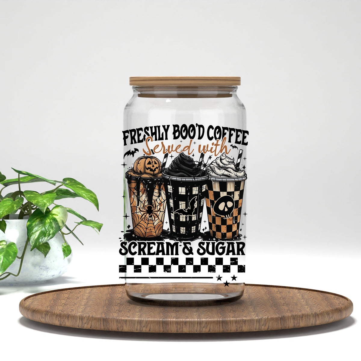 Freshly Boo'd Coffee UV DTF transfer on a clear glass can