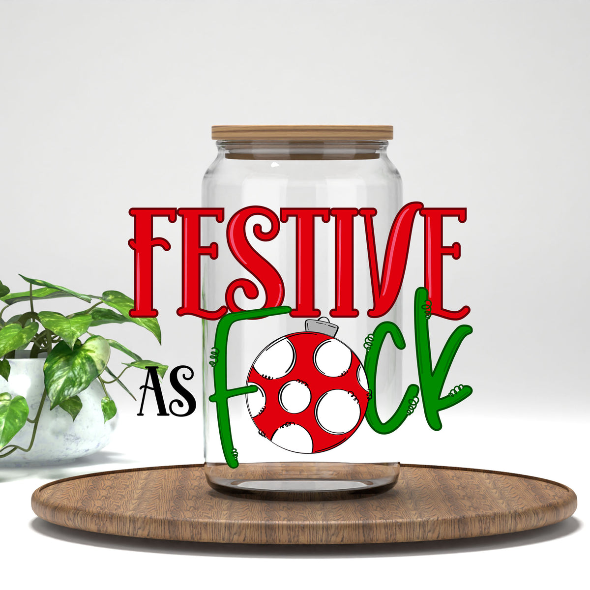 Festive As F*ck UV DTF transfer on a clear glass can