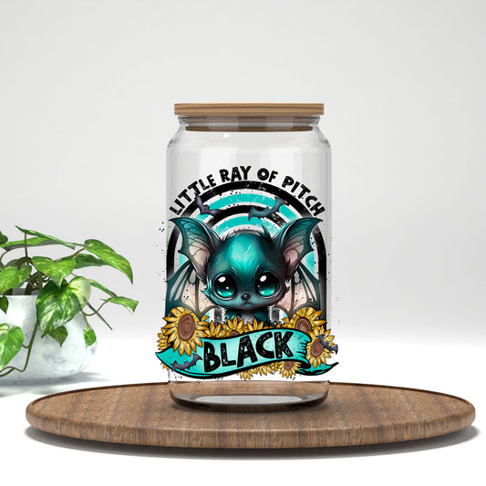 Little Ray of Pitch Black UV DTF transfer on a clear glass can