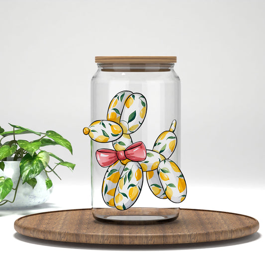 Balloon Dog lemons and pink bow UV DTF transfer on a clear glass can