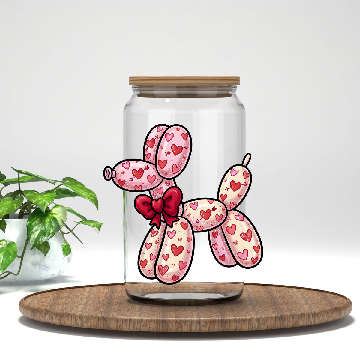 Balloon Dog pink hearts UV DTF transfer on a clear glass can