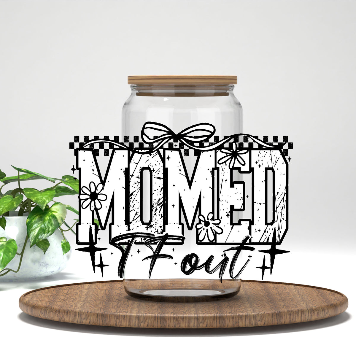 Momed TF Out UV DTF transfer on a clear glass can