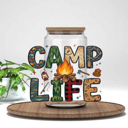 Camp Life plaid and campfire UV DTF transfer on a clear glass can