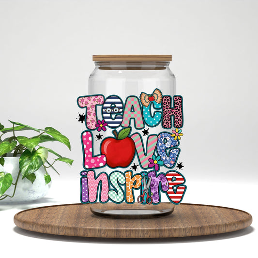 Teach Love Inspire patterned letters and apple UV DTF transfer on a clear glass can
