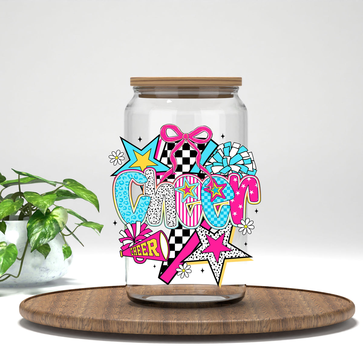 Cheer UV DTF transfer on a clear glass can