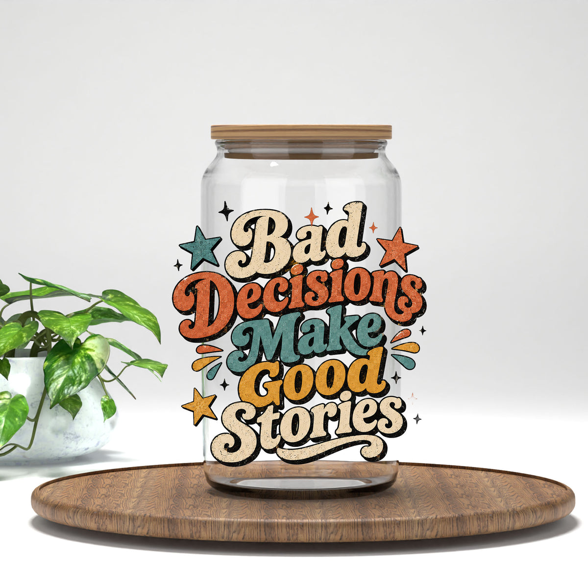 Bad Decisions Make Good Stories UV DTF transfer on a clear glass can