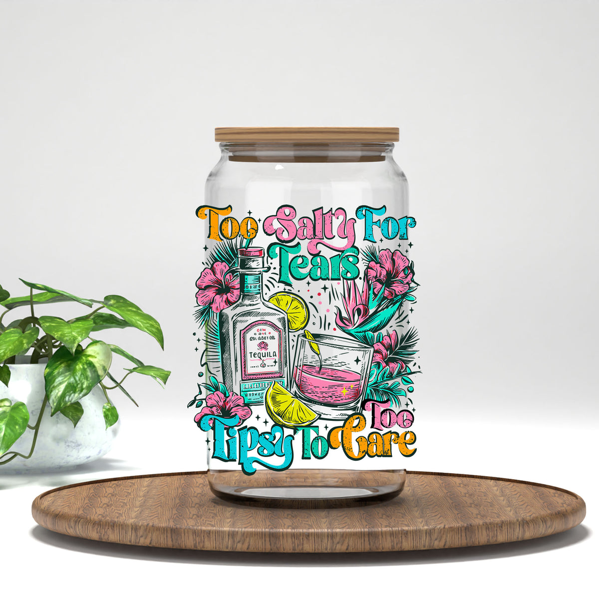 Too Salty for Tears Too Tipsy to Care UV DTF transfer on a clear glass can