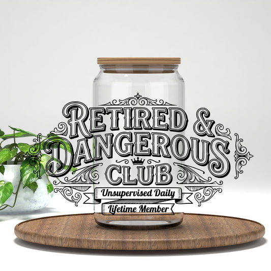 Retired and Dangerous Club UV DTF transfer on a clear glass can