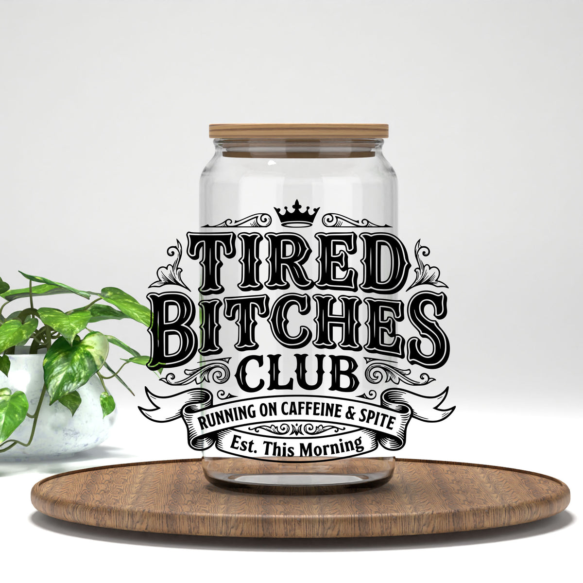 Tired B*tches Club UV DTF transfer on a clear glass can