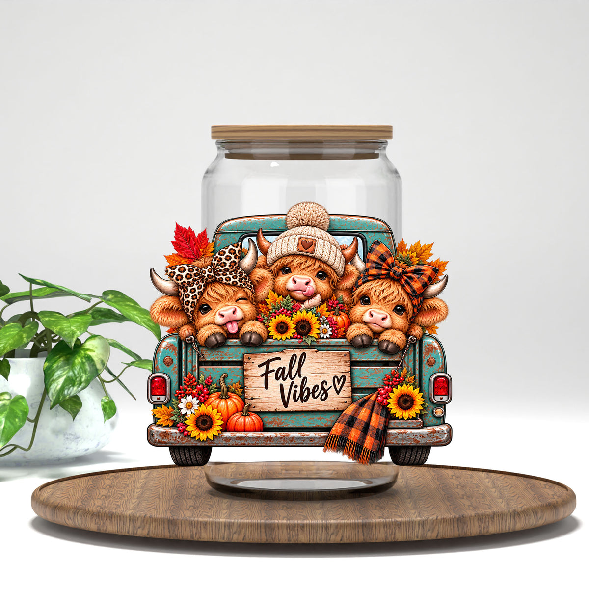 Fall Vibes Cute Cows highland cow UV DTF transfer on a clear glass can with a bamboo lid