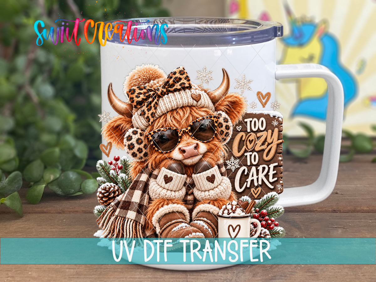 Too Cozy To Care highland cow UV DTF transfer on a white stainless steel mug with a lid