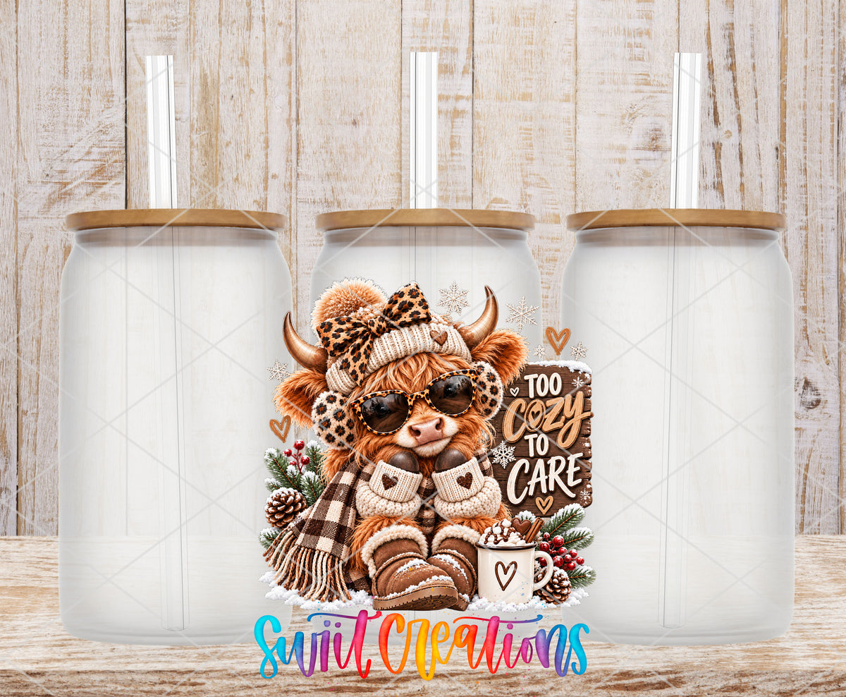 Too Cozy To Care highland cow UV DTF transfer on frosted glass cans with bamboo lids