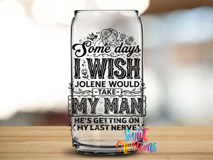 Close-up of the I Wish Jolene Would Take My Man UV DTF transfer on a clear glass can