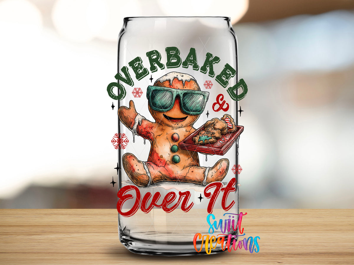 Close-up of the Overbaked And Over It gingerbread UV DTF transfer on a clear glass can