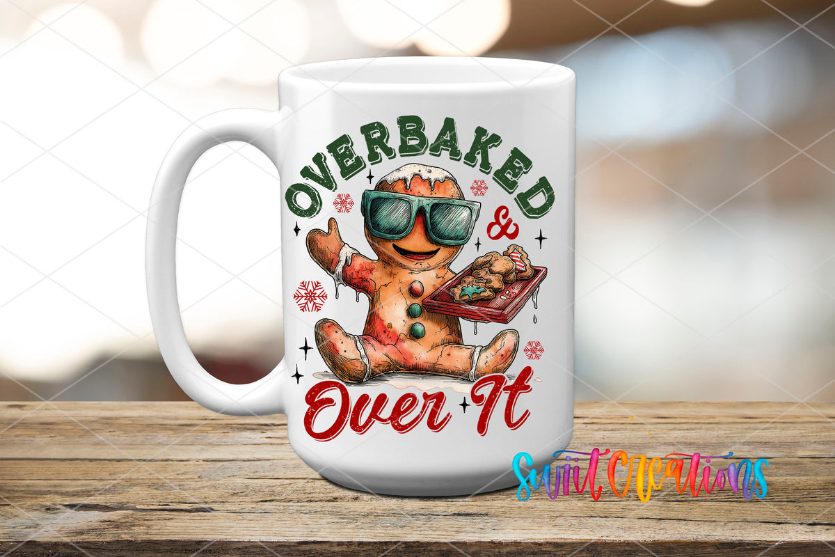Overbaked And Over It gingerbread UV DTF transfer on a white ceramic coffee mug