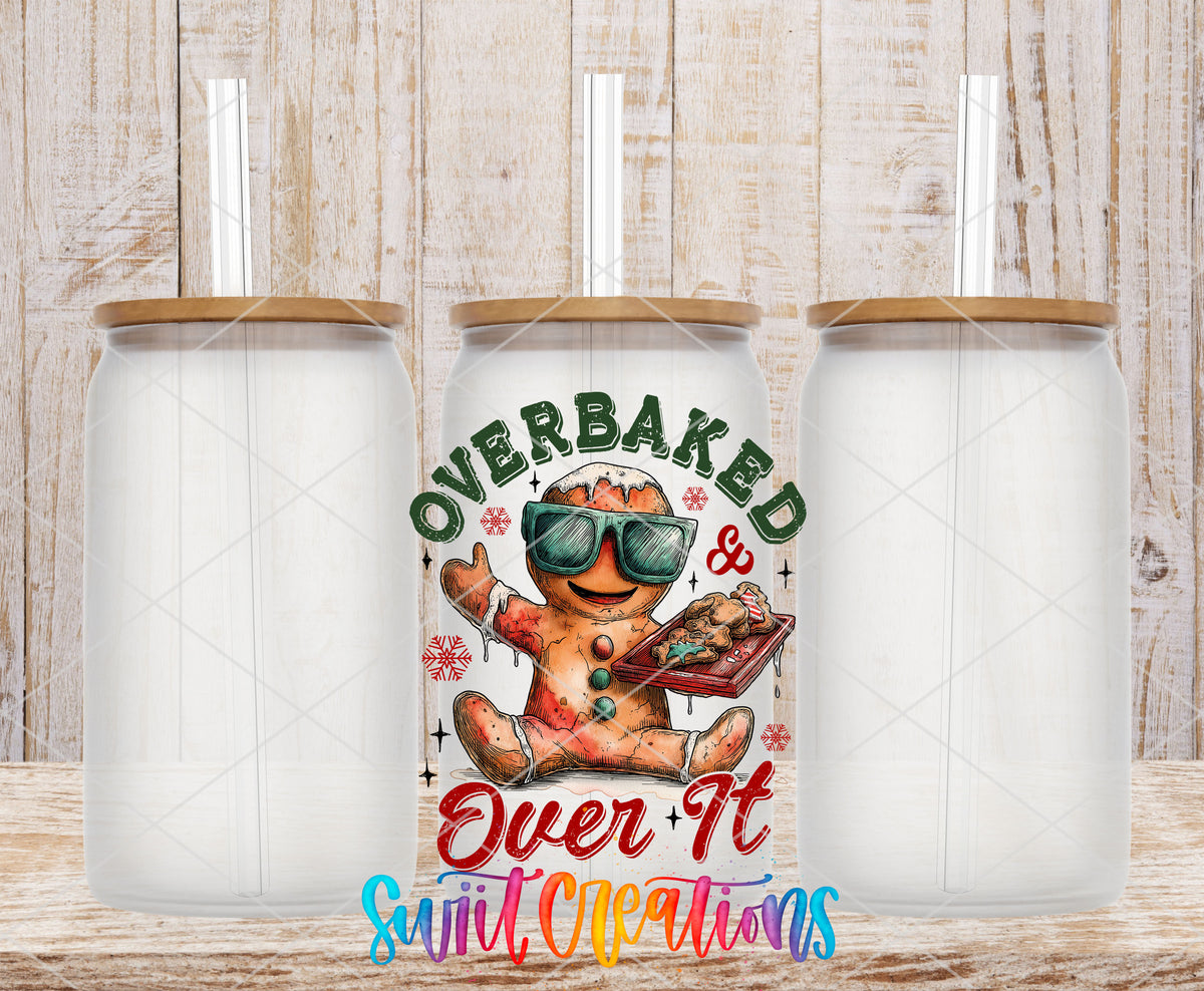 Overbaked And Over It gingerbread UV DTF transfer on frosted glass cans with bamboo lids