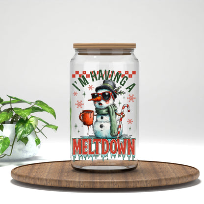 I'm Having A Meltdown snowman UV DTF transfer on a clear glass can with a bamboo lid