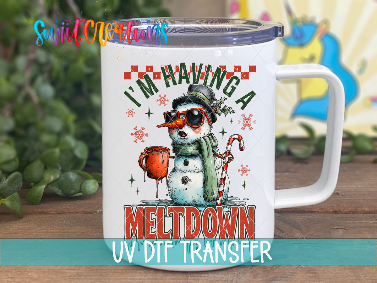 I'm Having A Meltdown snowman UV DTF transfer on a white stainless steel mug with a lid