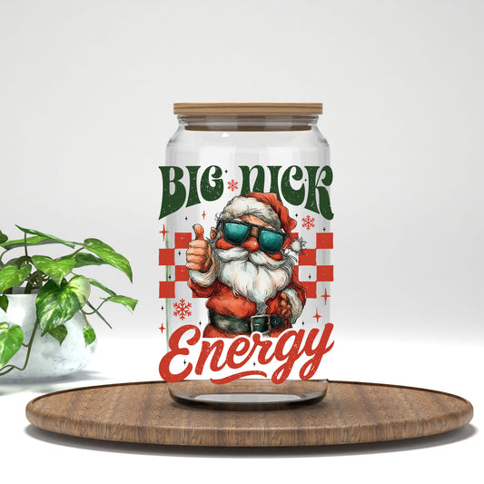 Big Nick Energy Santa UV DTF transfer on a clear glass can with a bamboo lid
