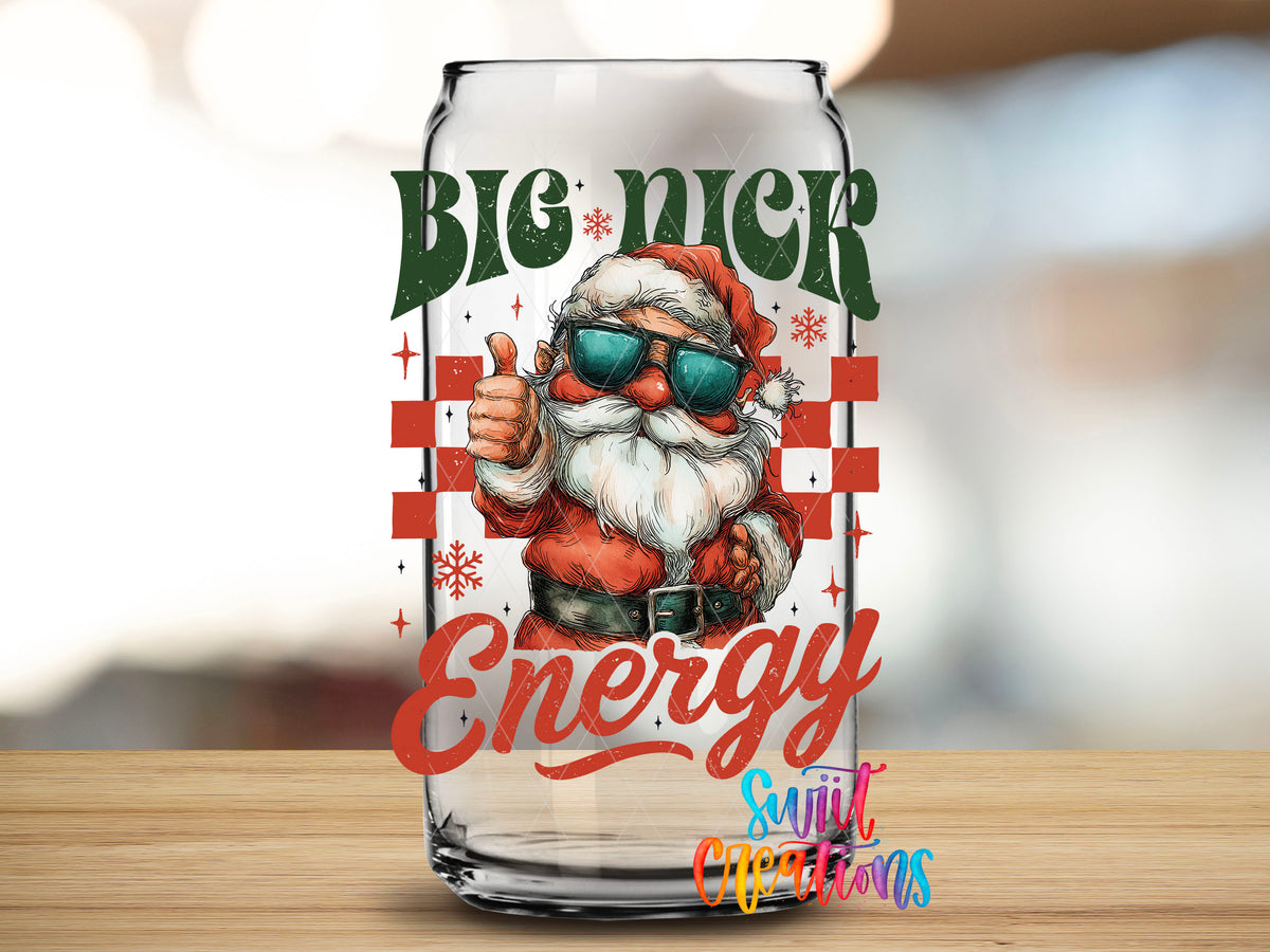 Close-up of the Big Nick Energy Santa UV DTF transfer on a clear glass can