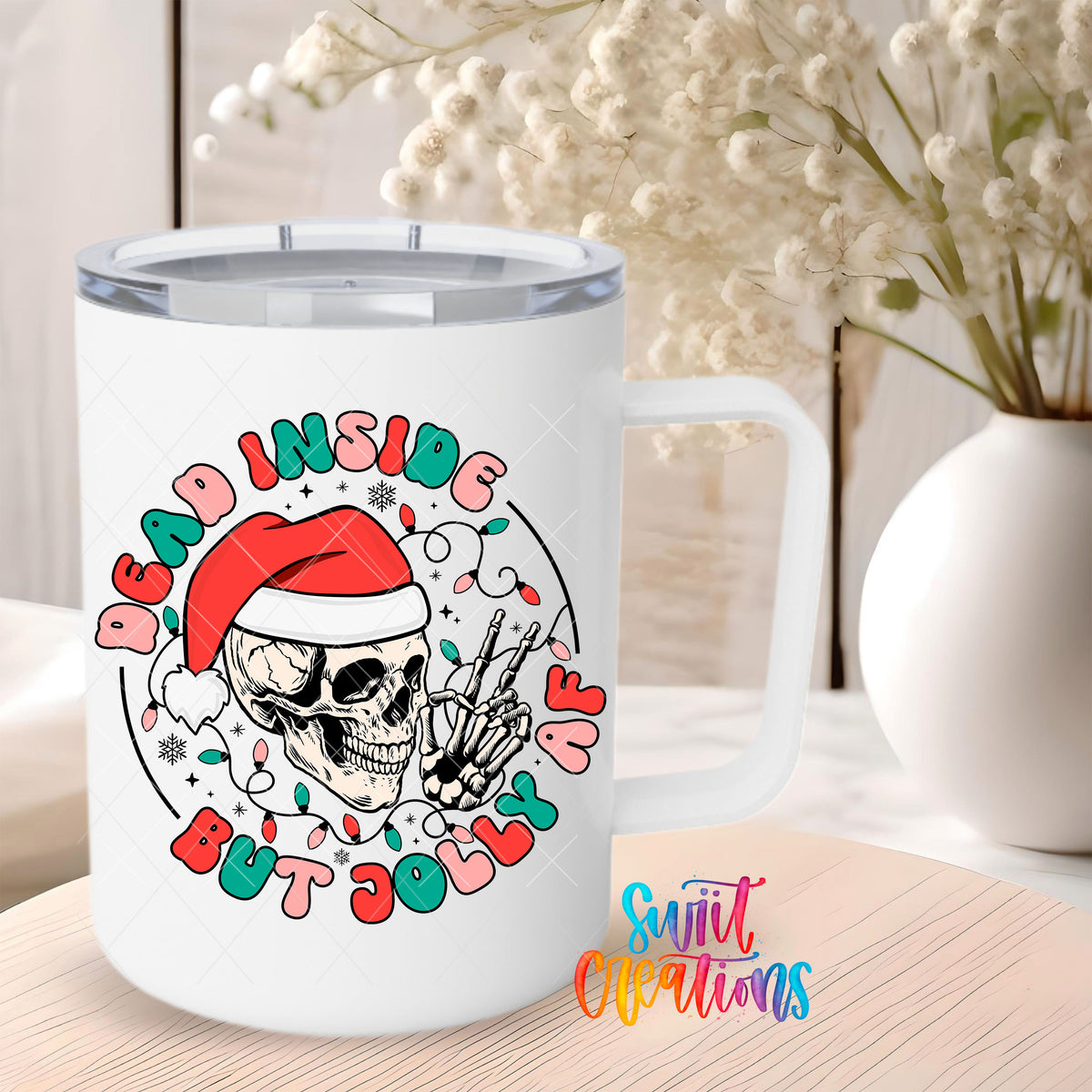 Dead Inside But Jolly AF skeleton UV DTF transfer on a 12 oz white stainless steel mug