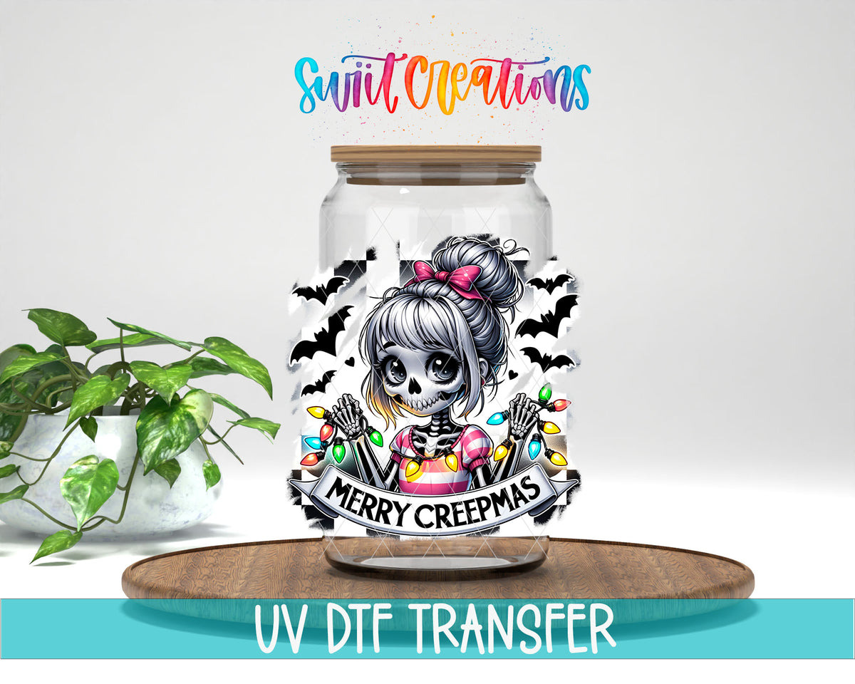 Merry Creepmas skeleton girl UV DTF transfer on a clear glass can with a teal UV DTF Transfer banner